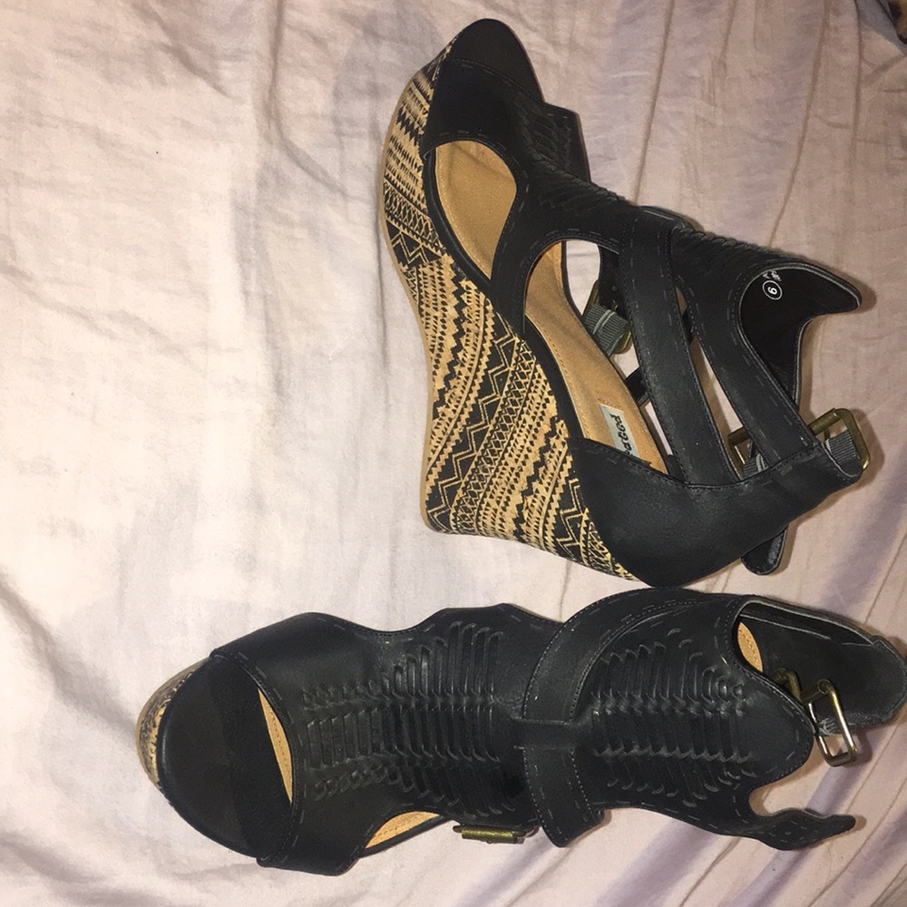 Not Rated Tribal Wedges.
